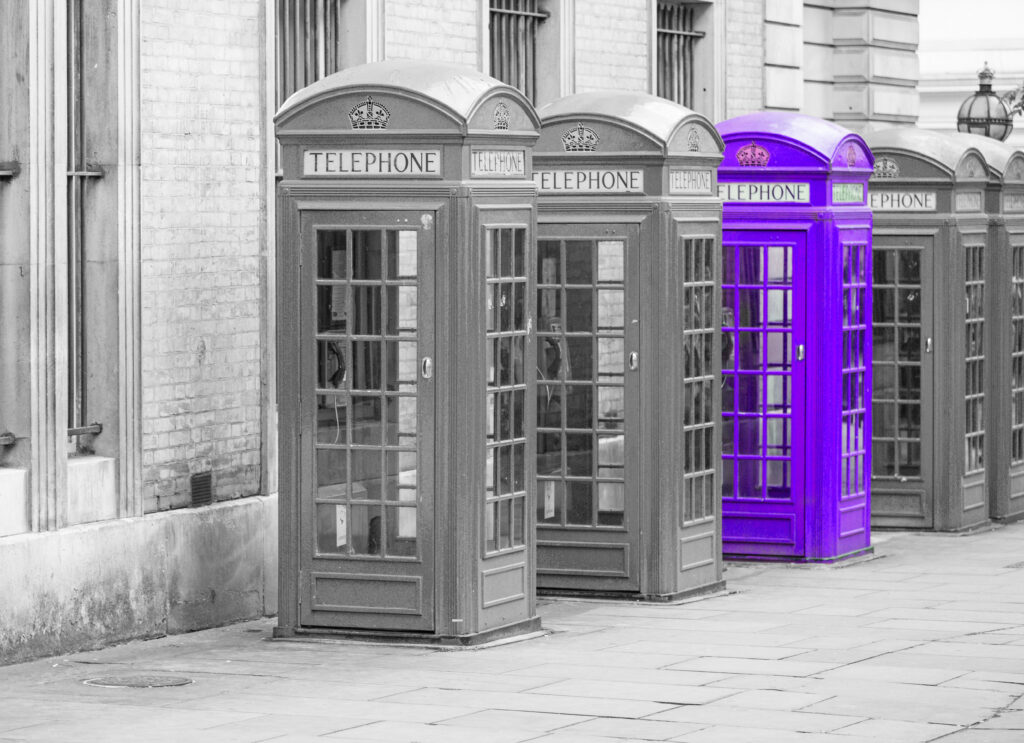 Vintage public phone booths representing let's talk.