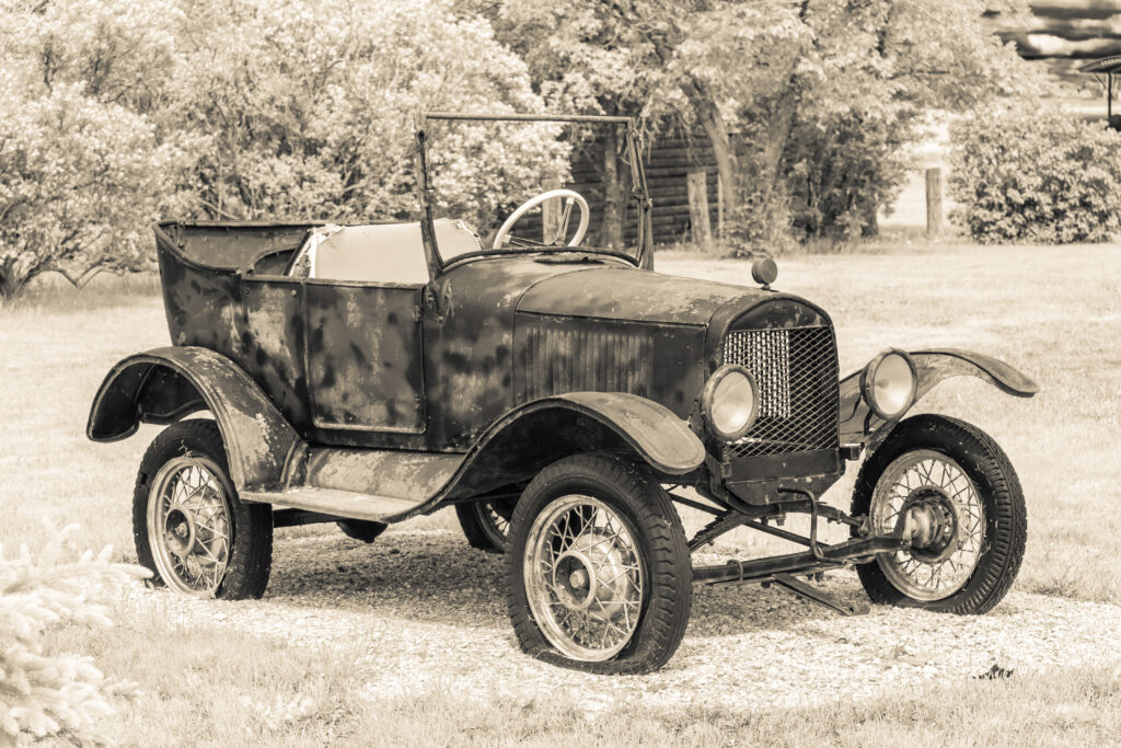 Black and white photo of rusted Model T Ford representing old technology and old thinking about ADHD driving.